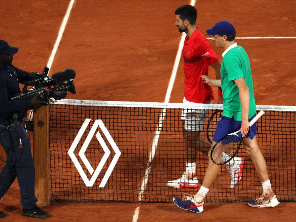Janik Siner i Novak Đoković posle polufinalnog okršaja